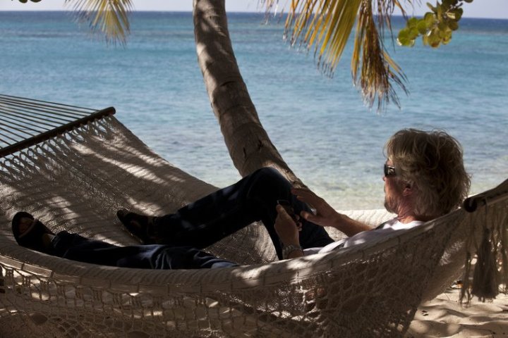 Richard Branson in his Hammock on Necker Island
